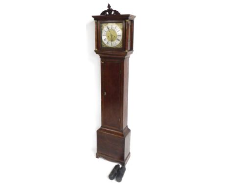 A Georgian oak longcase clock, the chapter ring named for John Bayley of Bridgewater, the square dial with brass cherub spand