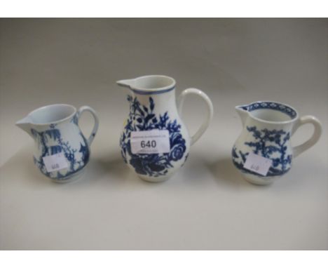 First Period Worcester blue and white sparrow beak jug, 10cms high together with two similar smaller jugsAll have been restor