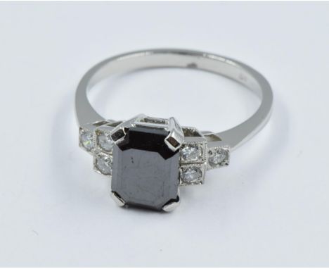 Platinum Deco style ring set with central square cut black diamond flanked by diamonds, size 'N' 