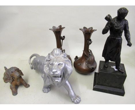 Painted metal figure of a lion, painted metal table lighter in the form of dog and a brown patinated spelter figure of a Maso