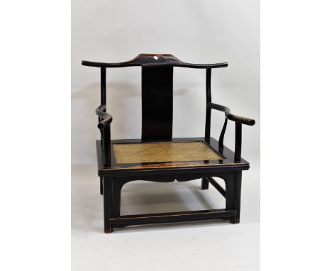 Pair of 20th Century Chinese elm and black lacquer yoke back armchairs, the rattan seats with button upholstered squab cushio