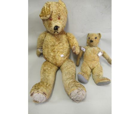 Large straw stuffed jointed teddy bear (at fault), together with a smaller jointed teddy bear 