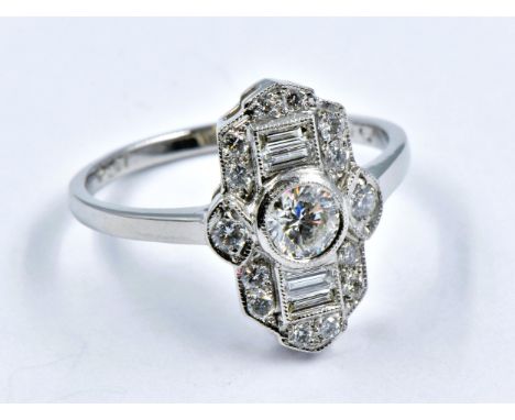 Platinum Art Deco style ring set with baguette and brilliant cut diamonds, .80ct, size 'O' 