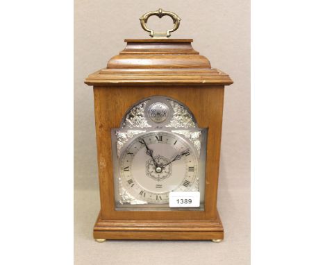 20th Century Elliott mahogany bracket clock, the silvered dial with Roman numerals, inscribed 1952 - 1977 ER, 26cms highIt is