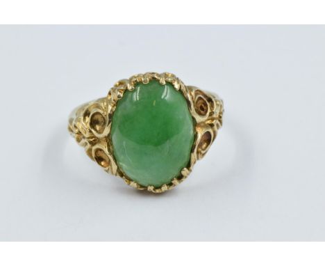 9ct Gold oval green jade set ring, size MGood overall condition. 3.4g in weight. Jade is 12mm x 10mm 