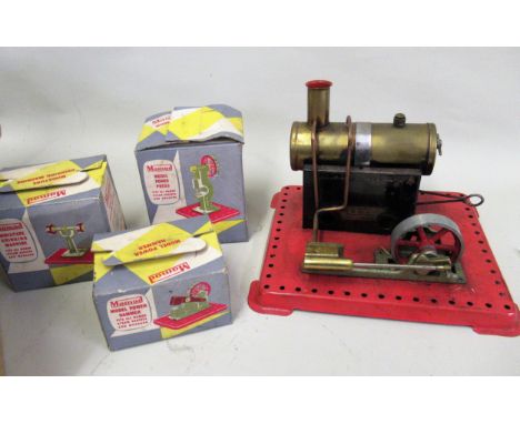 Mamod stationary engine with burner, and three boxed miniature power press hammer and grinding machines 