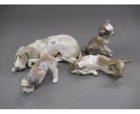 Lladro figure of a bloodhound, 25cms wide together with three other Lladro figures of a calf and two dogs 