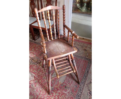 Late 19th / early 20th Century child's high chair with embossed seat, bobbin turned back and supports, together with 20th Cen