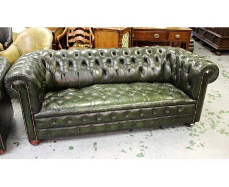 Good quality green deep button leather upholstered Chesterfield settee, 2m wide, together with a matching armchair, 1m wide 