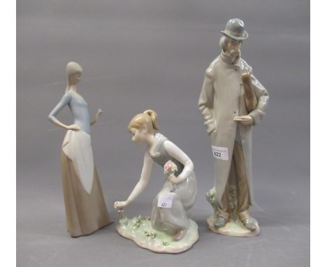 Lladro figure, gentleman in an overcoat with violin, in associated box together with two other Lladro figures of girls 