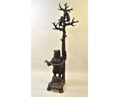 Late 19th Century Black Forest carved hallstand in the form of a standing bear with cubs in the tree above, 230cms high appro