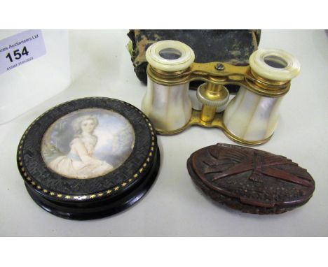 19th Century carved coquilla nut snuff box, an early 19th Century English circular snuff box with portrait inset lid and a pa