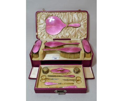 Birmingham silver and pink translucent enamel dressing table set/ manicure set in original fitted case, (comb lacking)Brushes