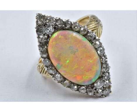 18ct Yellow gold marquise ring set oval opal surrounded by diamonds, the opal approximately 17mm x 11mm, size O 