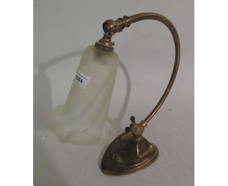 Brass adjustable desk lamp, having a vaseline glass shadeNo chips or cracks but does have slight scratches 