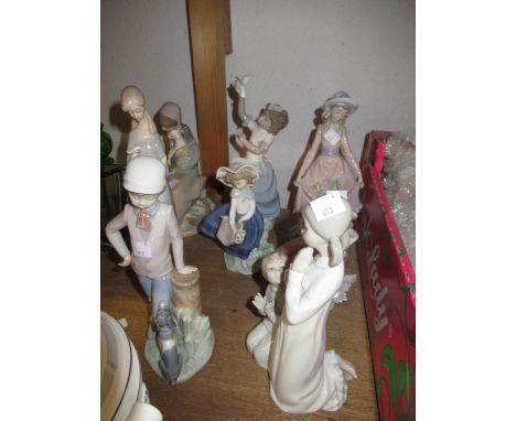 Group of six various Lladro figures of children, together with two Nao figures 