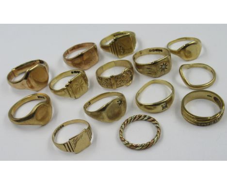 Nine various 9ct gold signet rings, together with five other 9ct gold rings including a buckle ring, 51gThree are badly disto