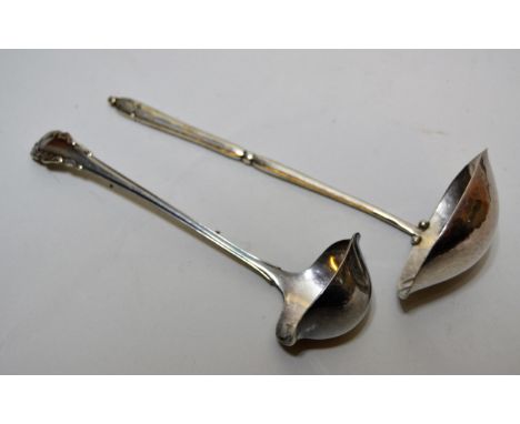 Georg Jensen, (925 mark) silver ladle of stylised form and another, smallerBoth are in good condition with no damages.Length 