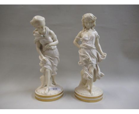 Pair of Worcester porcelain ivory coloured figures of girls, each on a circular gilded plinth base, printed marks in green, 2