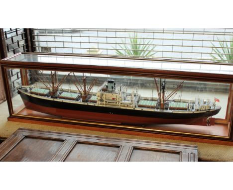 Scale model of Eumaeus 7.308GT built Baltimore 1943 in a mahogany and glazed display case, 43cms high x 148cms wide x 26cms d