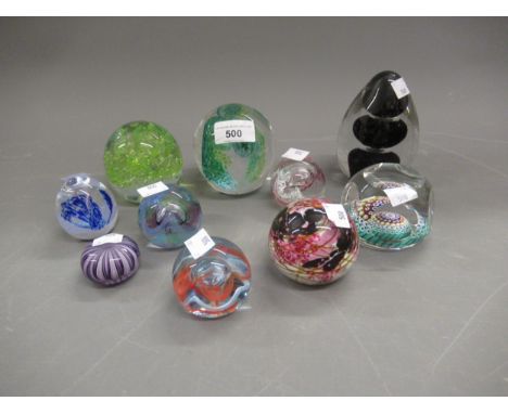 Collection of ten various modern glass paperweights, including Caithness 