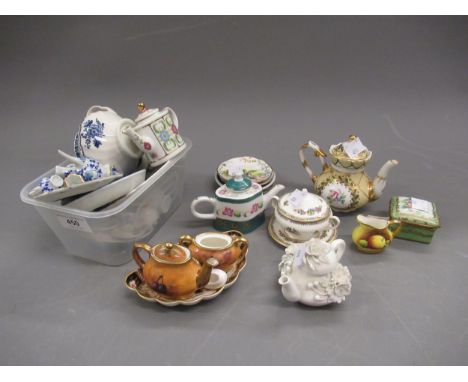 Coalport miniature three piece tea service, three other miniature tea services, miniature Derby white glazed teapot with flor