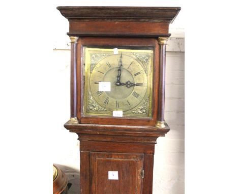 George III oak longcase clock, the square hood enclosing a brass dial inscribed John Uffington London, with a 30 hour movemen