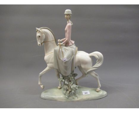 Large Lladro figure of a girl riding a horse, 43.5cms highExcellent condition. No chips, cracks or breaks 