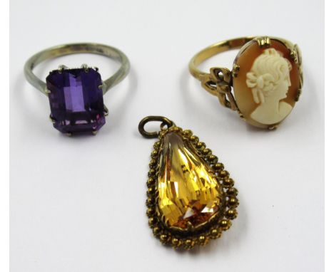 9ct Yellow gold shell carved cameo set ring, 9ct white gold baguette cut amethyst ring, and a yellow metal stone set pendant 