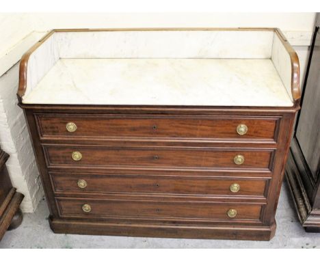 Late 19th Century French mahogany washstand with a sliding marble top above four drawers with gilt brass ring handles, above 