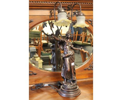 20th Century bronzed figural table lamp, in the form of a classical maiden with yellow and clear etched glass shades 