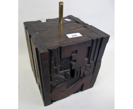 Square form lamp base, constructed from printing type set letters 