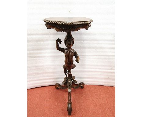 A 19th century jardiniere or lamp stand, the carved figural column support raised on scrolling tripod base, 78cm high