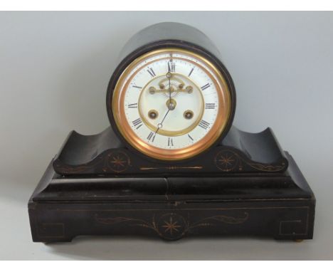 19th century black slate drum head mantel clock, the enamel chapter ring with Roman numerals over a twin train movement and o