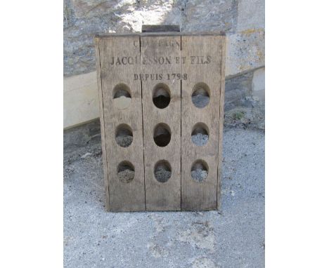 A weathered oak champagne bottle rack/stand with folding easel back, printed lettering champagne, Jacqursson et Fils Depuis 1