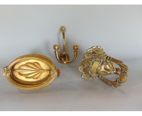 Good quality Regency style cast brass door knocker in the form of a maidens head, together with a further Regency gilt brass 