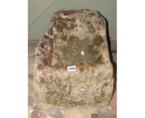 A weathered 19th century, or possibly earlier, stone trough of rectangular form, 45 cm long x 34 cm wide x 30 cm in height ap