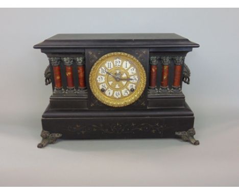 Interesting American wooden black slate style twin train mantel clock, the architectural case with cast metal corinthian colu