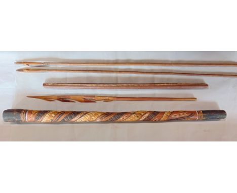 A collection of Aboriginal artifacts to include a didgeridoo, two long spears approx 2.3 m, a shorter spear and further blunt
