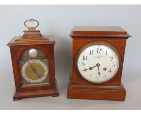 Goldsmiths &amp; Silversmiths Co twin train inlaid walnut mantel clock, the bowed enamel dial with Arabic numerals, 23cm high