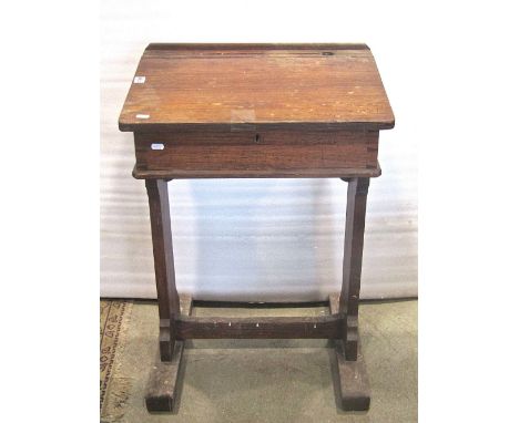 A vintage pitch pine child's school desk with ink well and hinged slope, together with a reproduction Georgian style tray top