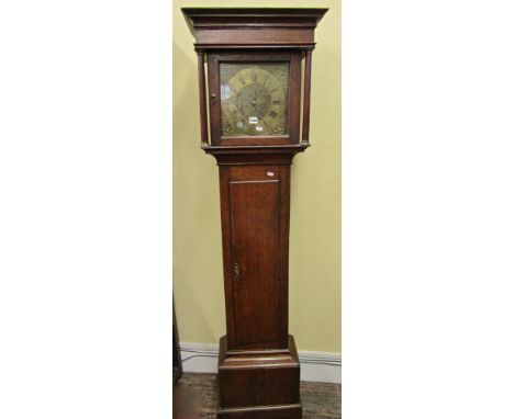 A Georgian oak countrymade longcase clock, the hood of square cut form, enclosing and 11 inch square cut brass dial, with app