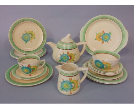 A collection of Clarice Cliff Wilkinson Rhodanthe tea wares with blue and yellow floral decoration including tea pot, cake pl