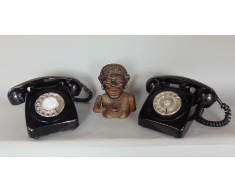 Novelty cast metal money box inscribed 'Dinah', together with two BT GPO Telephones (3)
