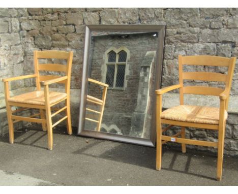 A 19th century mahogany wall mounted secretaire bookcase, together with a pair of contemporary low ladder back elbow chairs, 