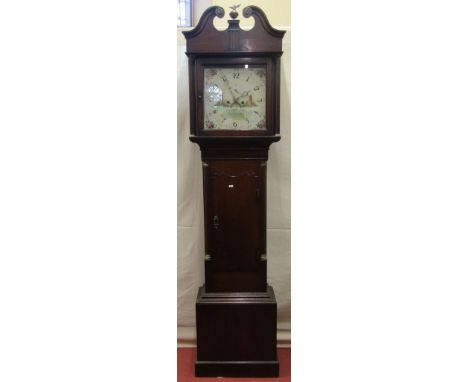 A Georgian oak longcase clock, the trunk with reeded and canted corners, the hood with swan necked pediment enclosing 34 cm s