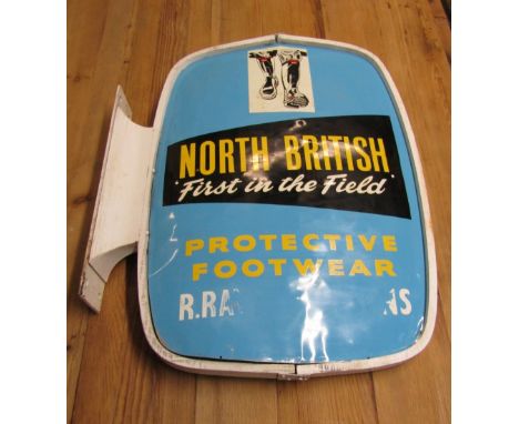 A vintage wall mounted painted aluminium exterior twin sided sign of oval form advertising North British 'First in the Field'
