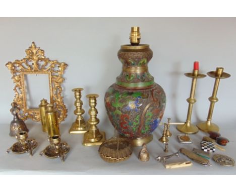 A box of interesting items to include a cloisonné baluster lamp, a collection of various silver and other coins, brass candle