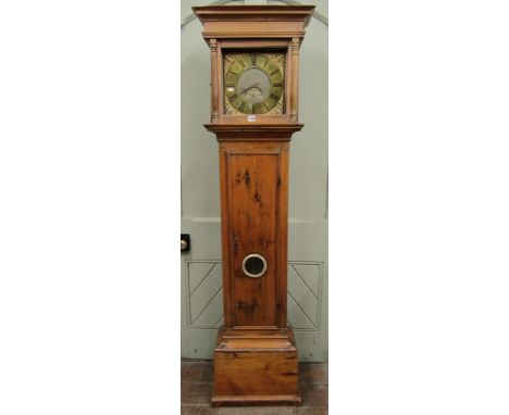A Georgian pine country made longcase clock, the stripped case enclosing a square brass dial with applied spandrels, calendar