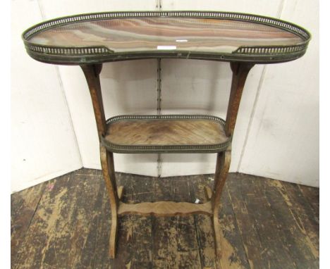 An Edwardian occasional table, the kidney shaped top with agate inset panel within a brass gallery frame, stretcher base with